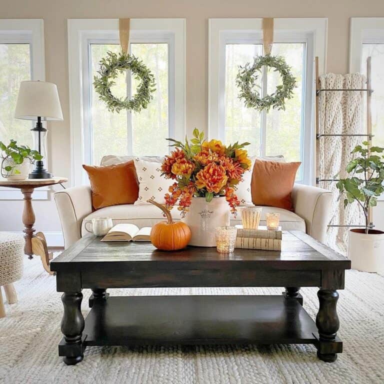 Warm Farmhouse Living Room With Greenery