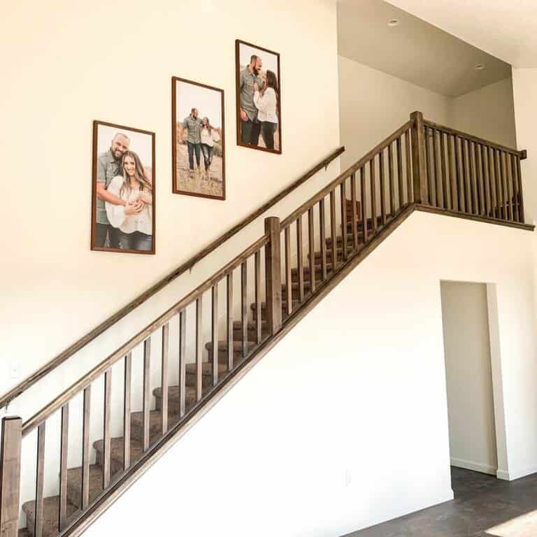 Warm Wooden Farmhouse Staircase Gallery Wall
