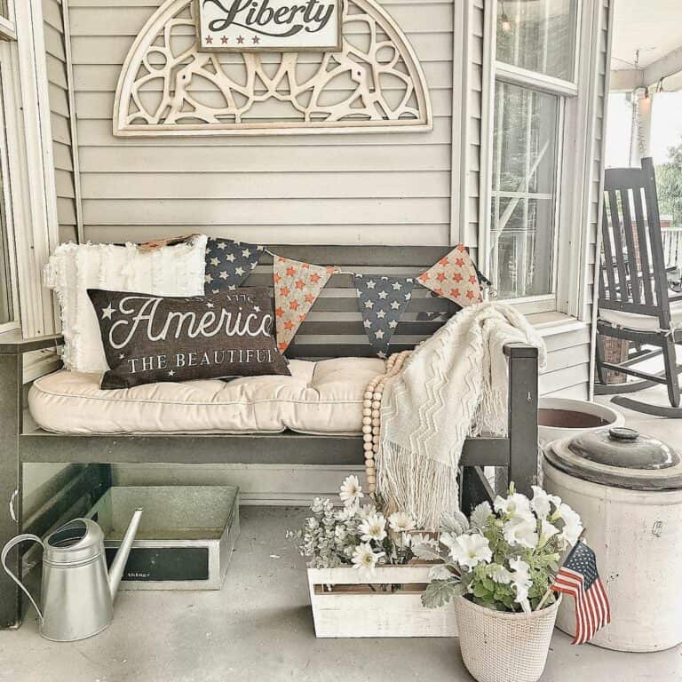 Welcoming Front Porch Bench With Patritic Decorations