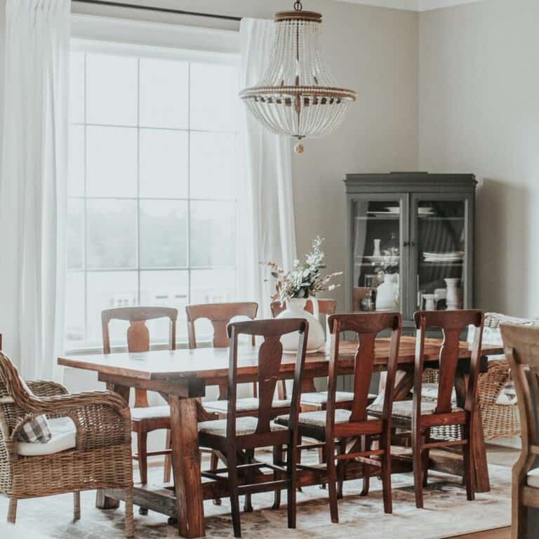 White Beaded Chandelier Over Wood Dining Set