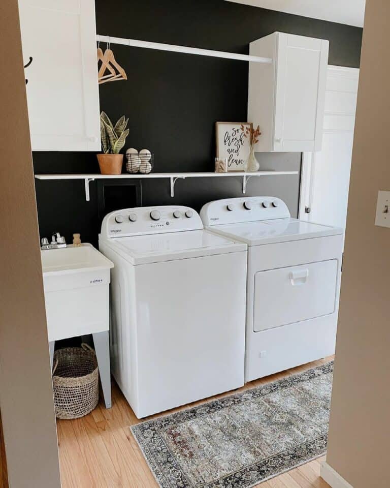 White Cabinets on a Black Accent Wall