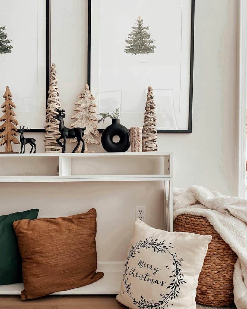 White Console Table With Black Christmas Reindeer Décor