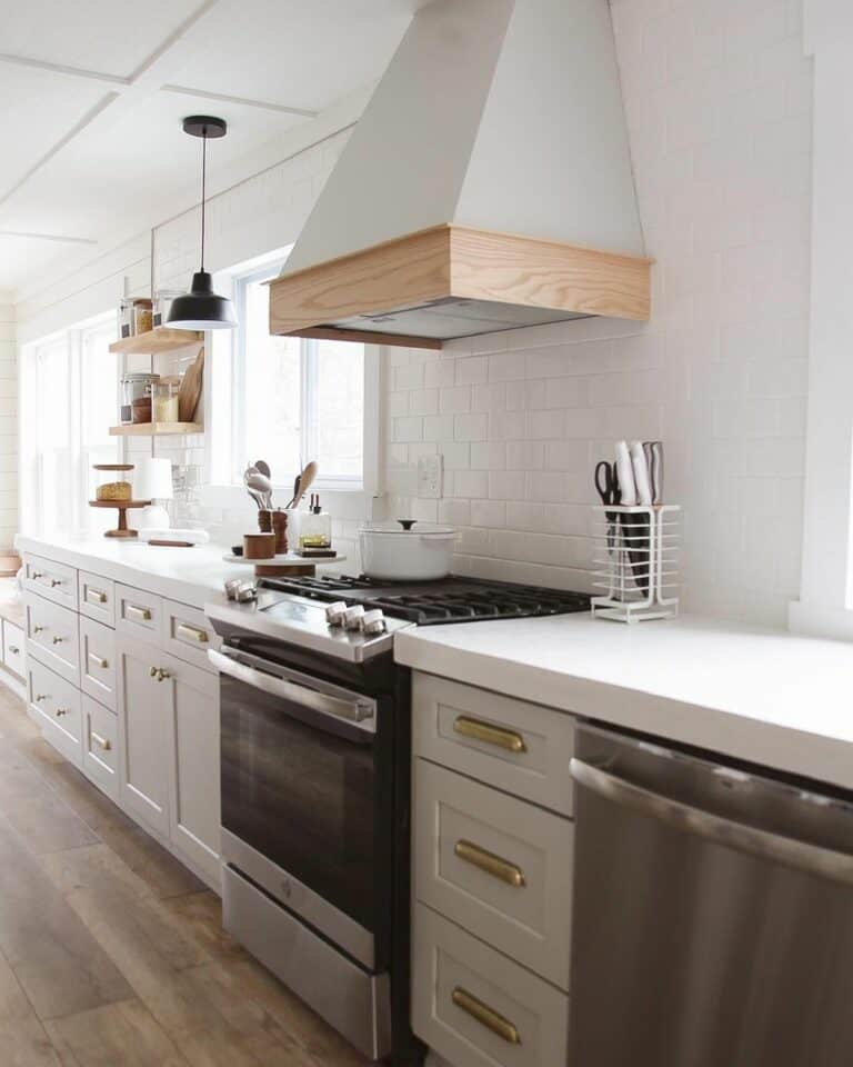 White Countertops Stretch Across Kitchen