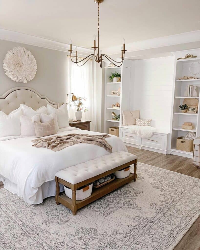 White Decorated Bedroom With a Gold Chandelier