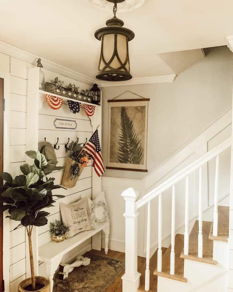 White Entryway Bench With Fourth of July Decorations