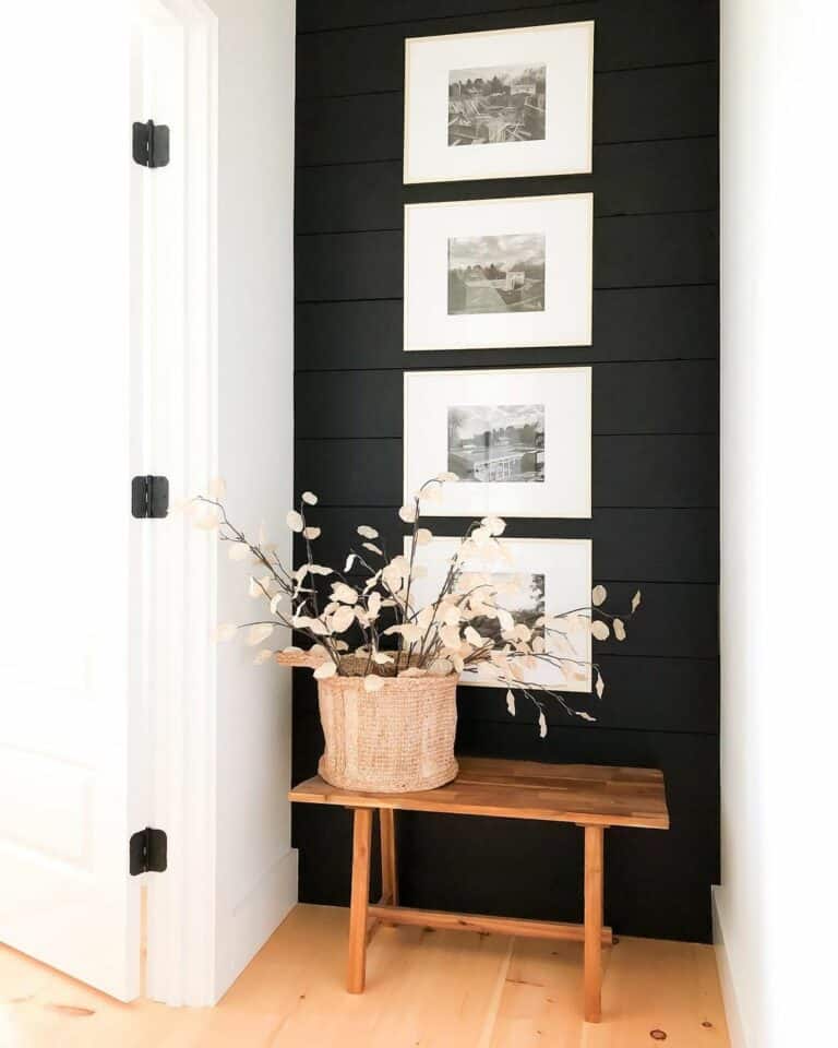 White Flowers and a Black Shiplap Accent Wall