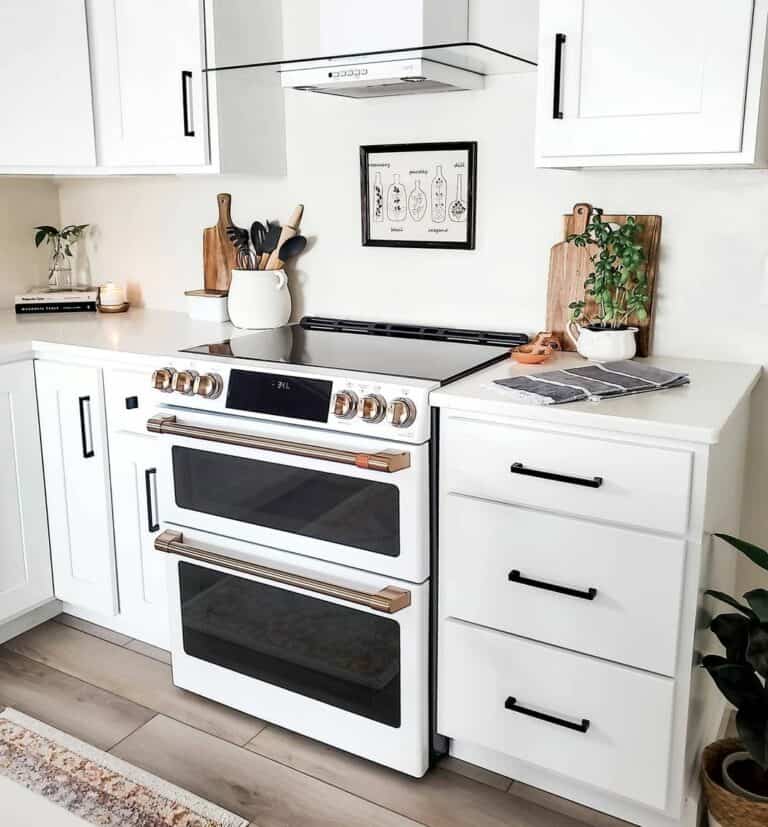 White Kitchen With Brass and Black Hardware