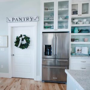 White Pantry Door Ideas With Green Wreath