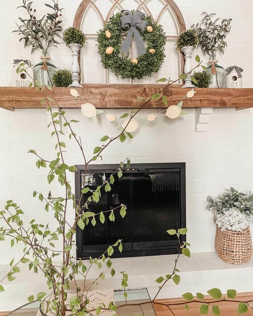 White Stone Fireplace With Vibrant Greens