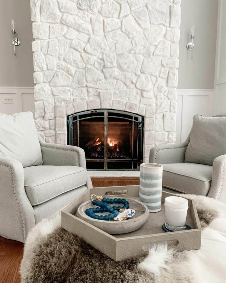 White Stone Fireplace in Grey Living Room