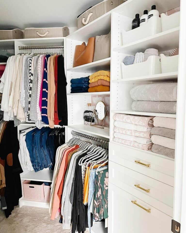 White Walk-in Wardrobe With Gold Hardware