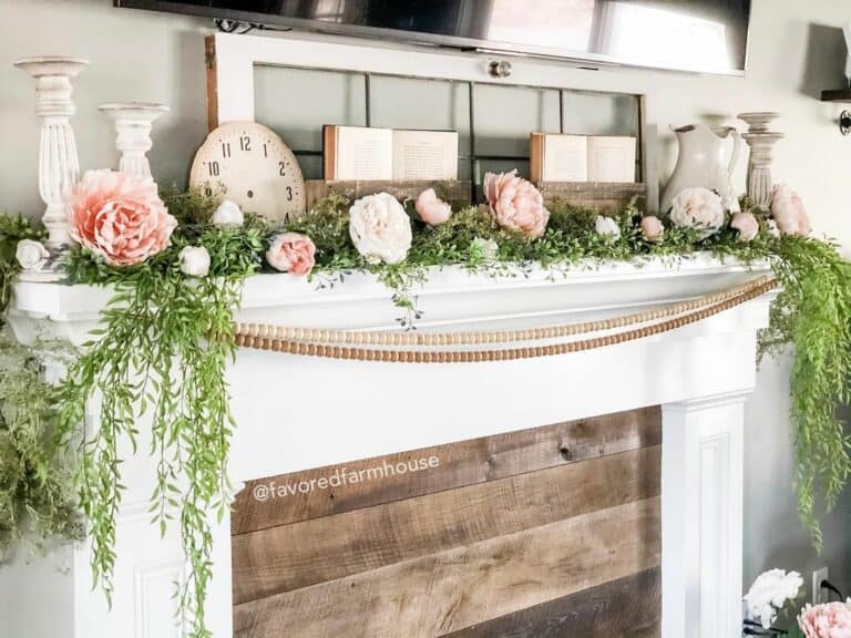 White Window Décor and a Delicate Green Garland