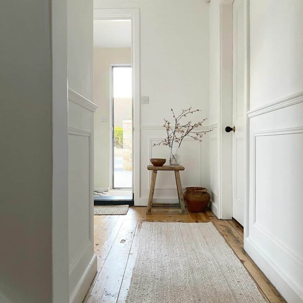 White-themed Hallway With Earthy Accents