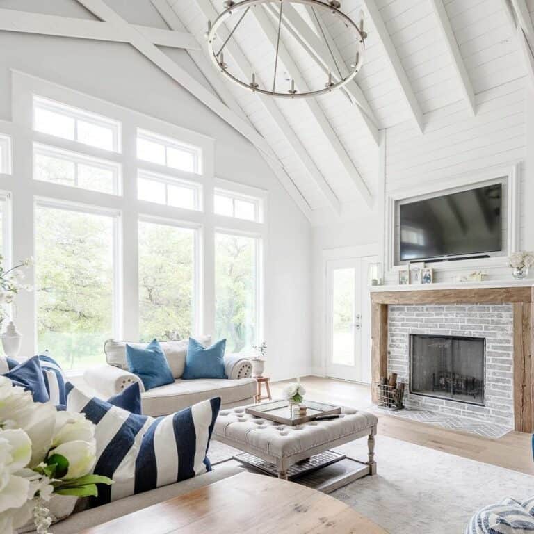 White-themed Living Room With Pops of Blue