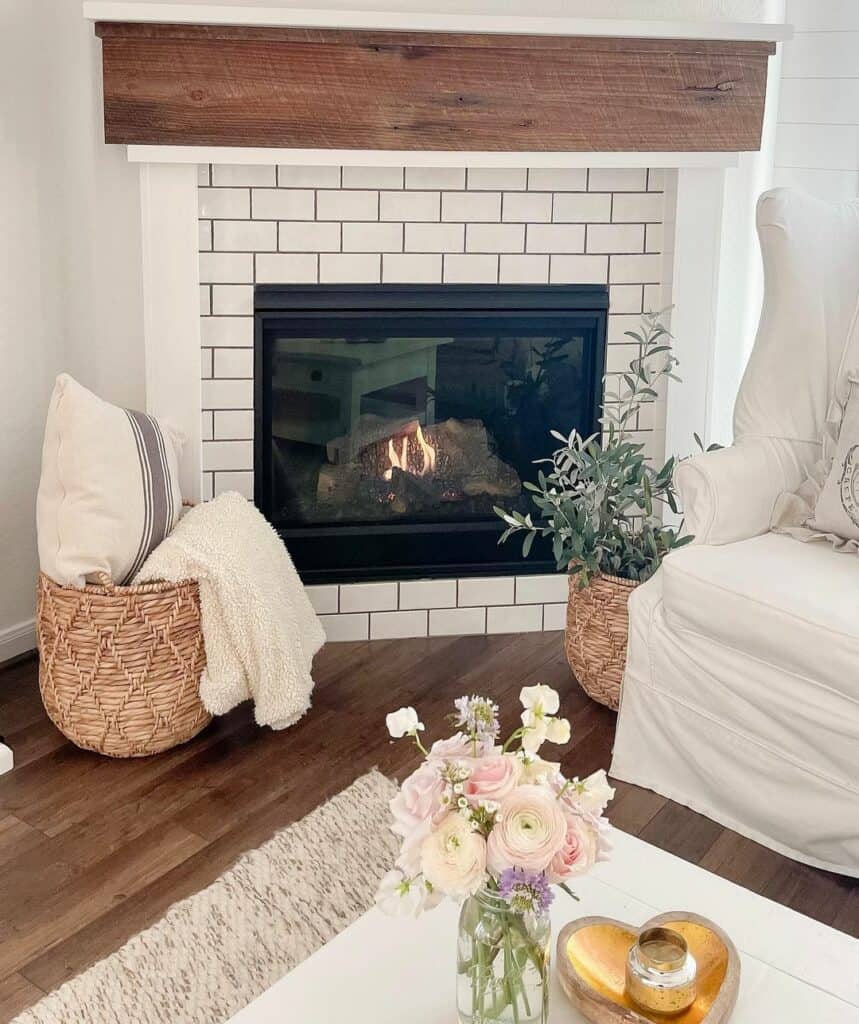 Wicker Baskets and a White Subway Tile Fireplace