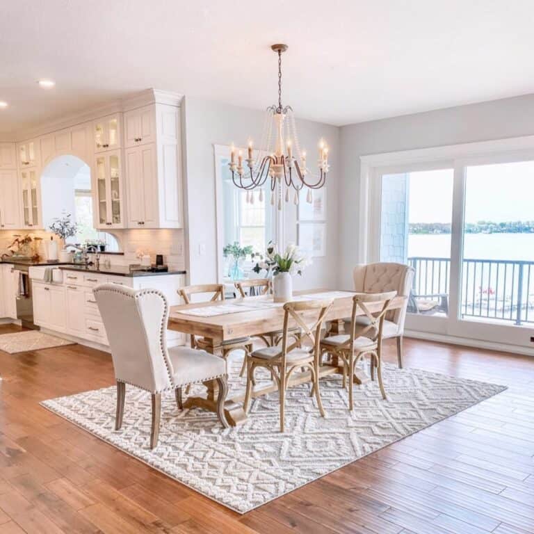 Wood Dining Table With White and Bronze Metal Chandelier