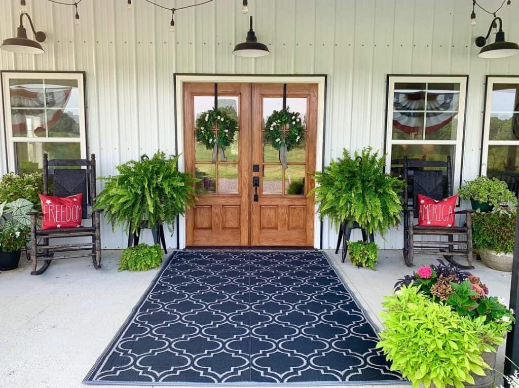 Wood Double Front Doors With Spring Wreaths