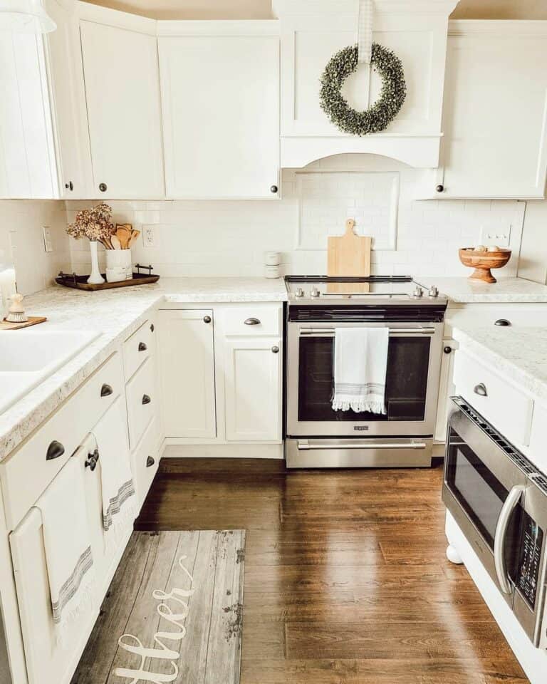 Wood Flooring Surrounded by White Cabinets