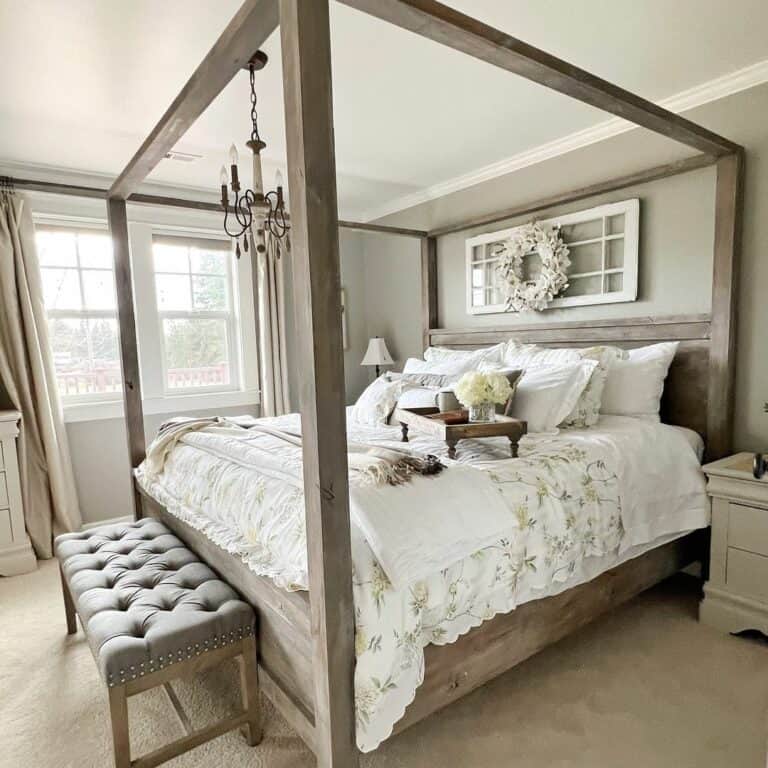 Wooden Four-Poster Bed with Floral Accents