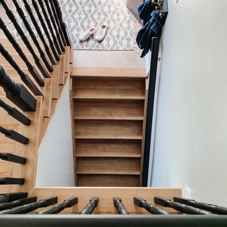 Wooden Stairwell With Black Spindles