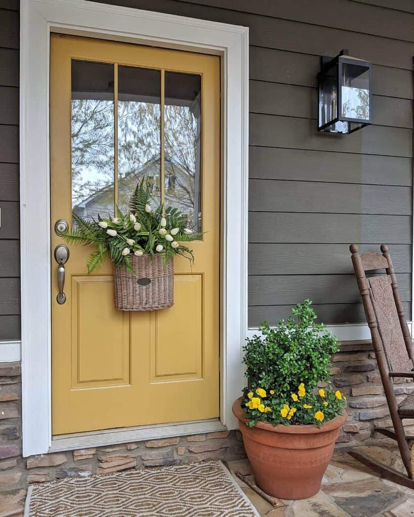 Yellow Door With Floral Hanging Basket