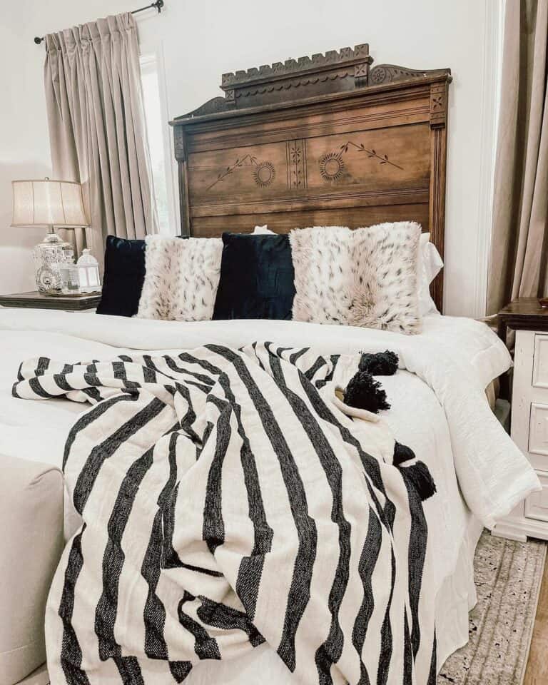 Antique Headboard With Animal Print Accents