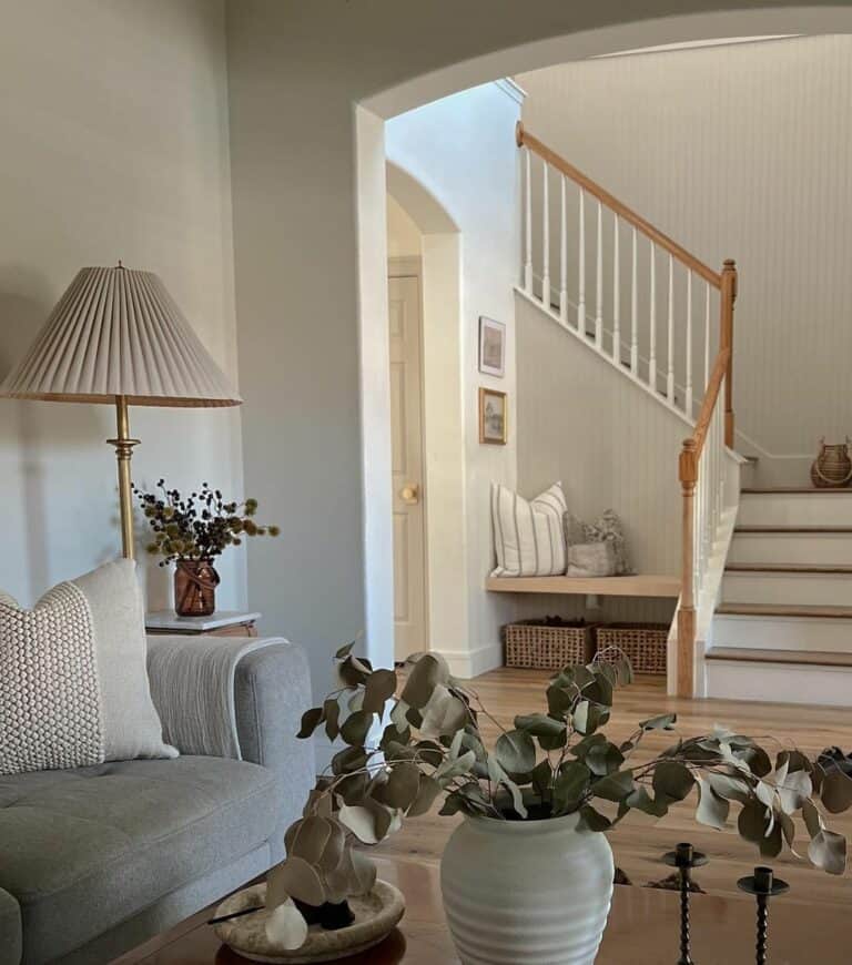 Arched Living Room Doorway to a Staircase