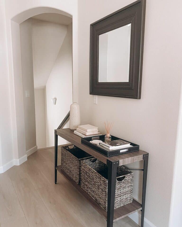 Archway Leads Into Cream-colored Entryway