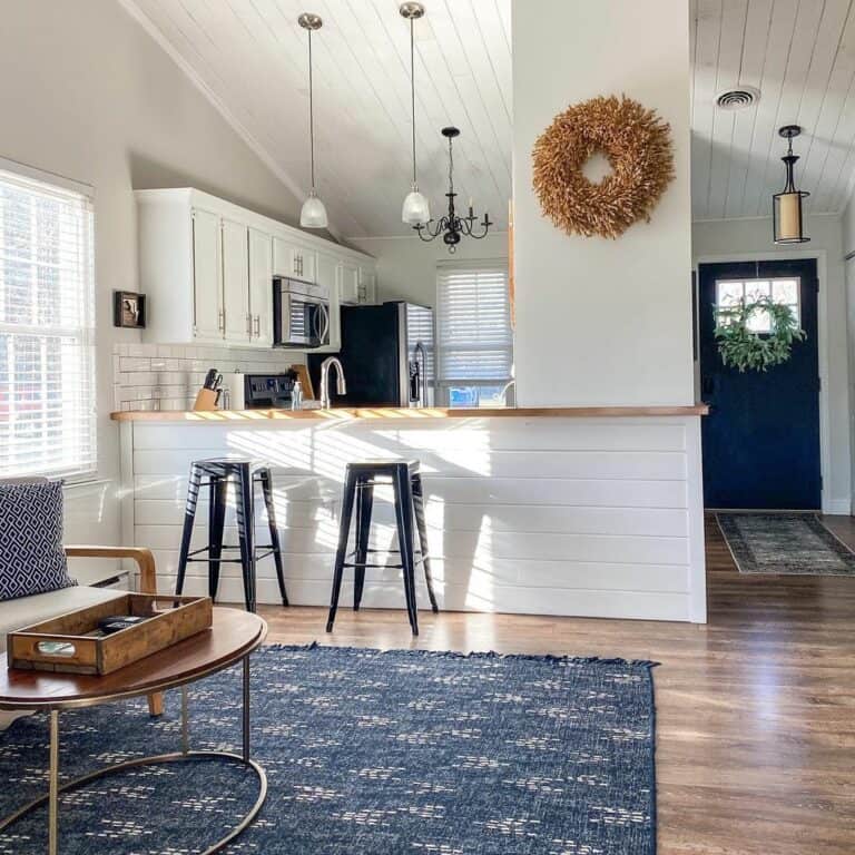Assorted Pendant Chandeliers on a Sloping Shiplap Ceiling