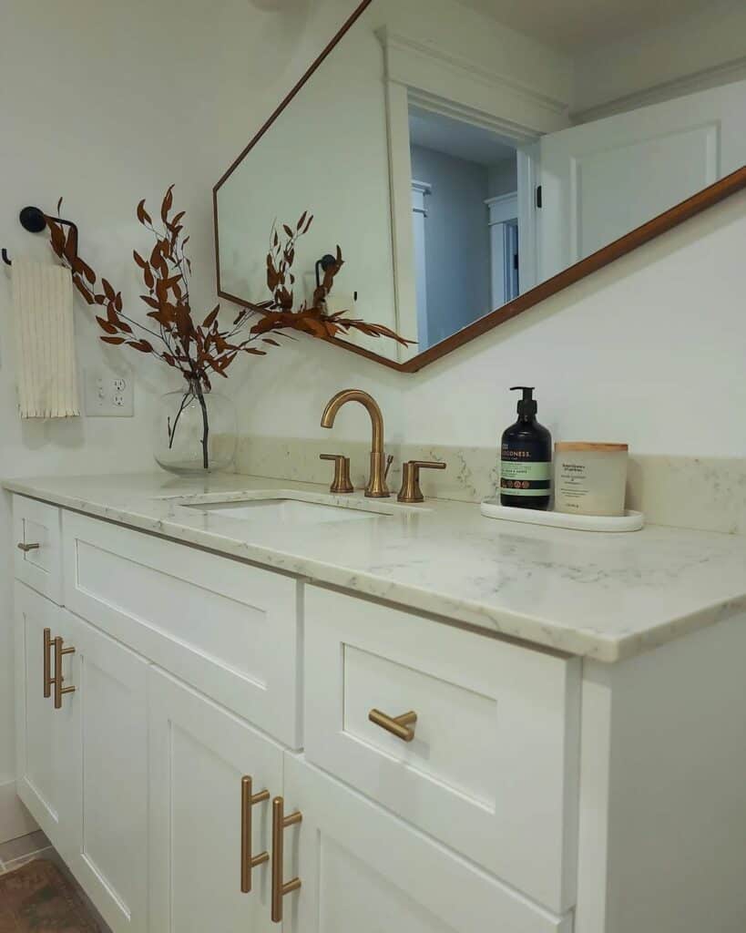 Asymmetrical Mirror Over Beige Countertop