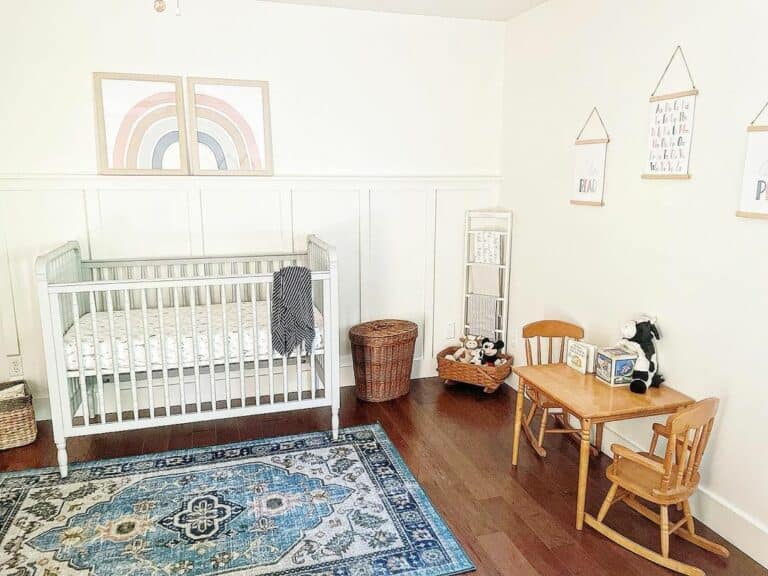Baby Room With Vibrant Blue Oriental Rug