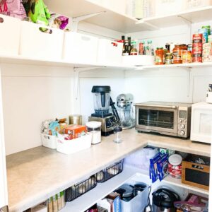 Beige Countertop Hosts Kitchen Appliances