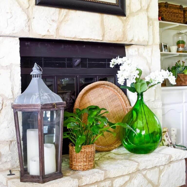 Beige Stone Fireplace With Green Bottle Vase Décor