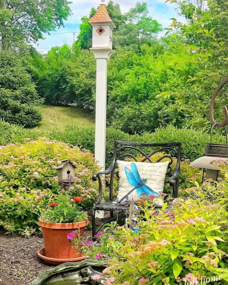 Birdhouses Accessorize a Lush Garden