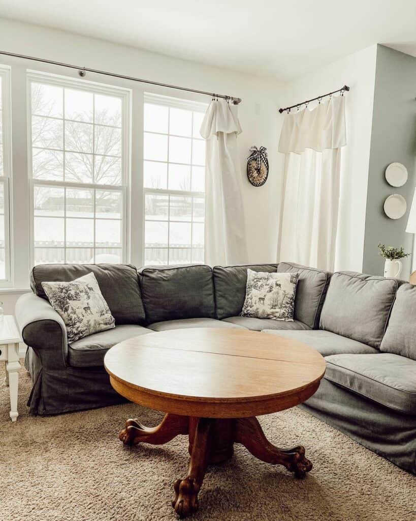 Biscuit-colored Rug Under Round Coffee Table