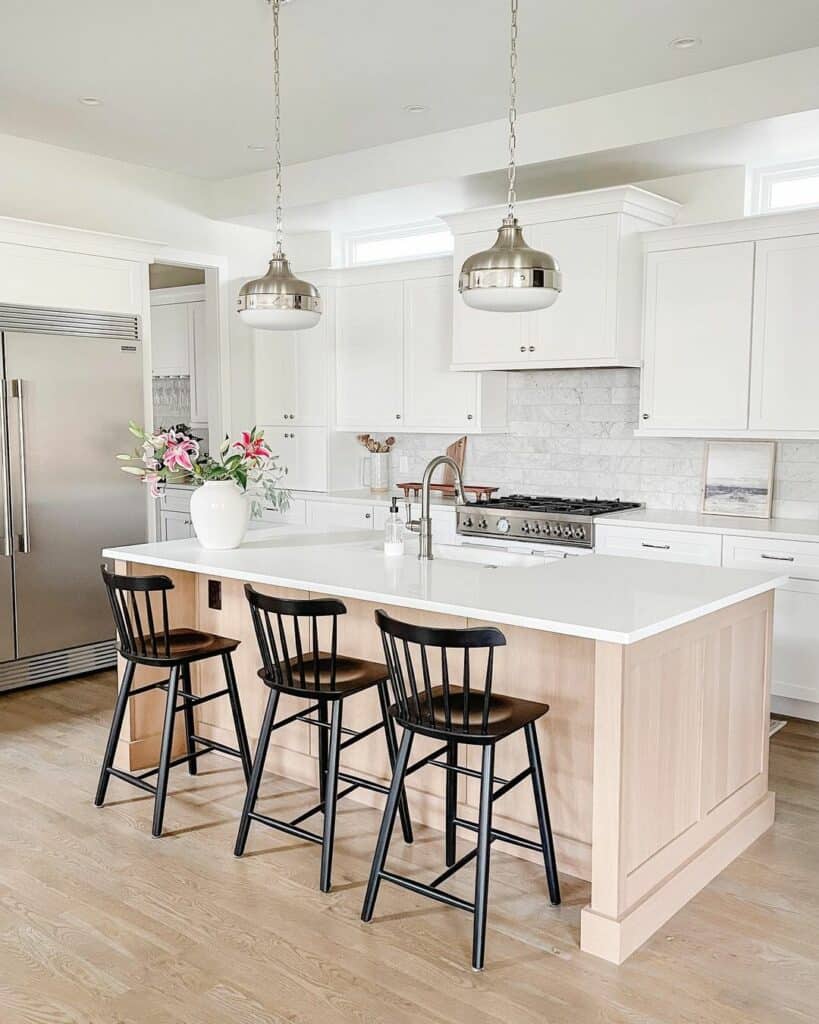 Black Bar Stools in White Kitchen