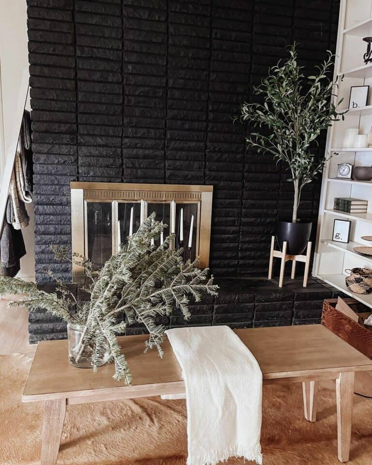 Black Brick Painted Fireplace Ideas With Potted Greenery