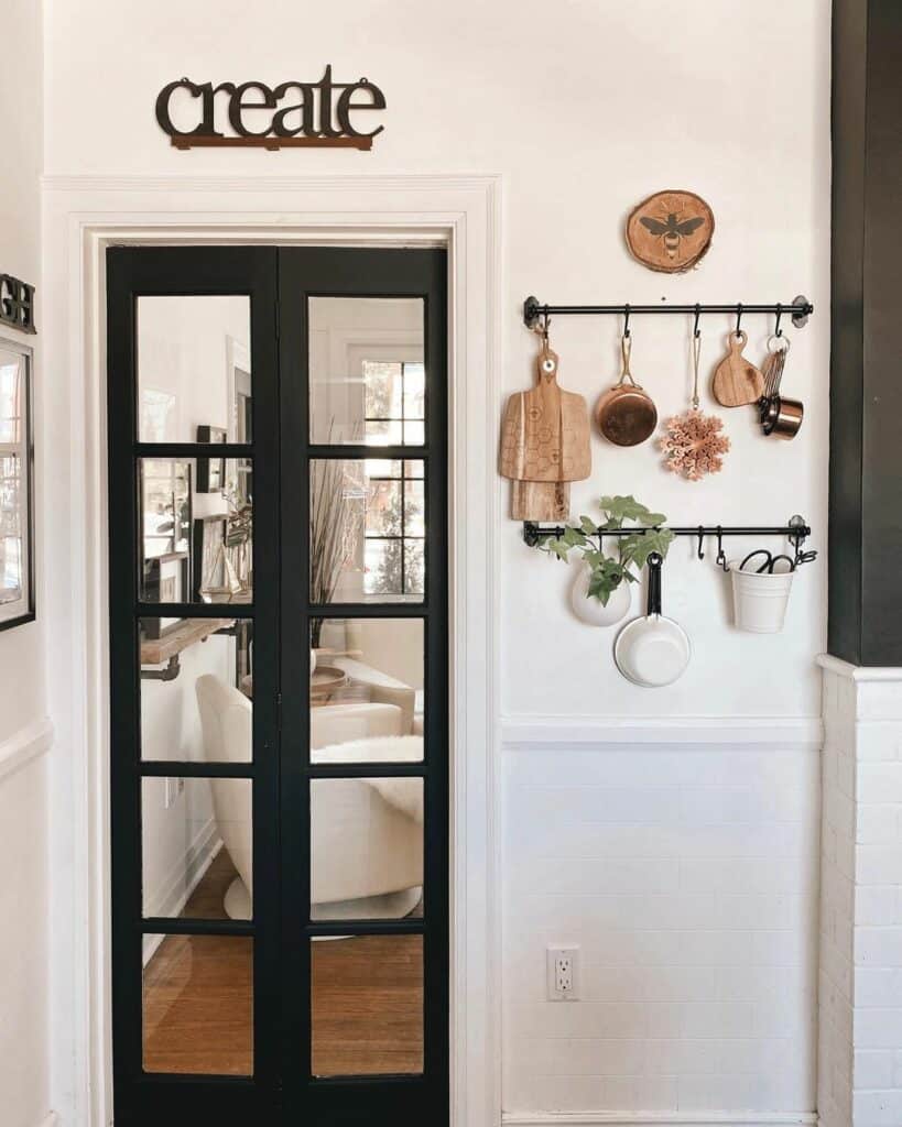 Black Double Doors With Windows and White Trim
