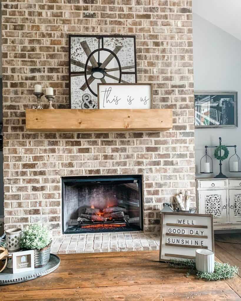 Black Fireplace Against a Brick Wall Backdrop