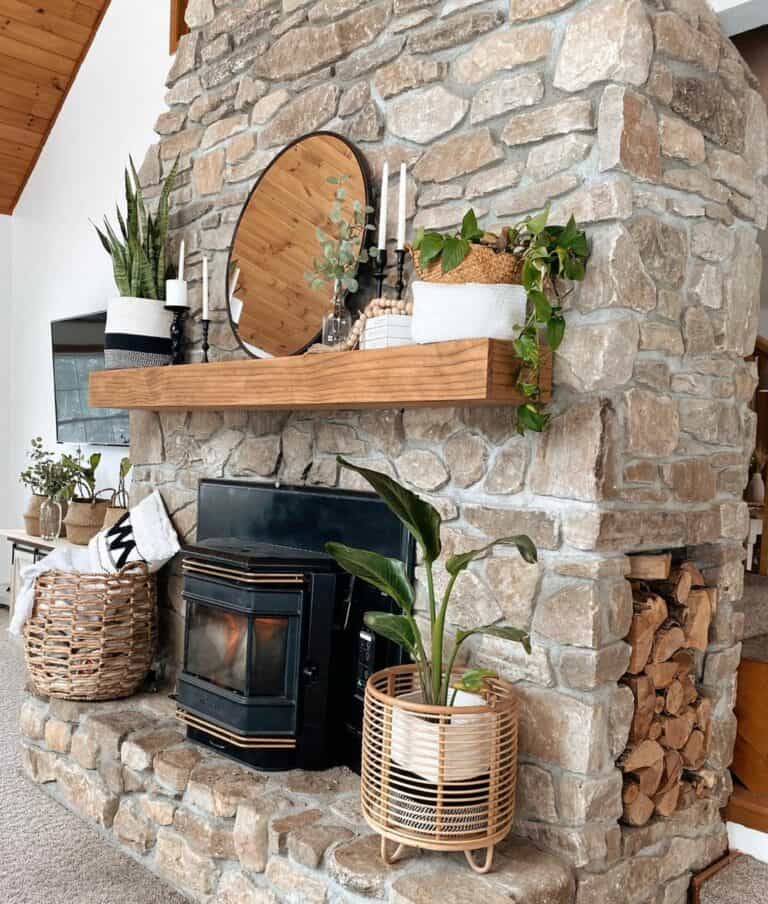 Black Fireplace Against a Stone Chimney