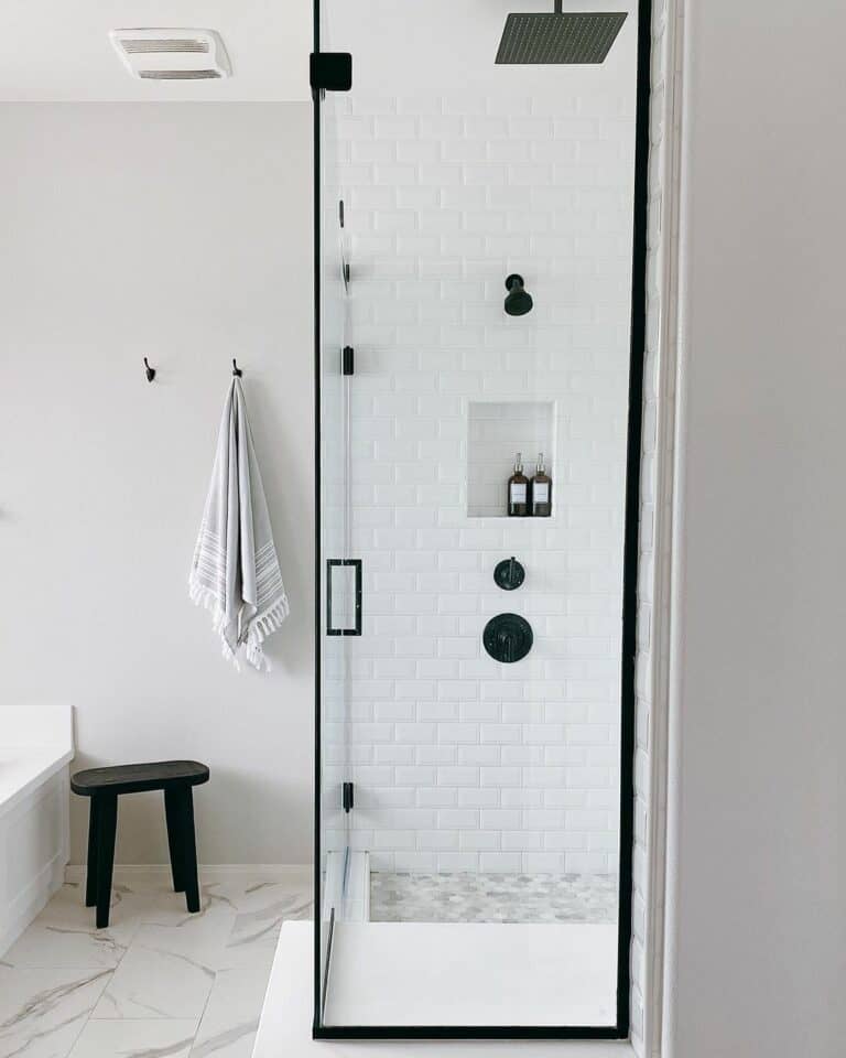 Black Frame Glass Walk-in Shower With Minimalist Accents