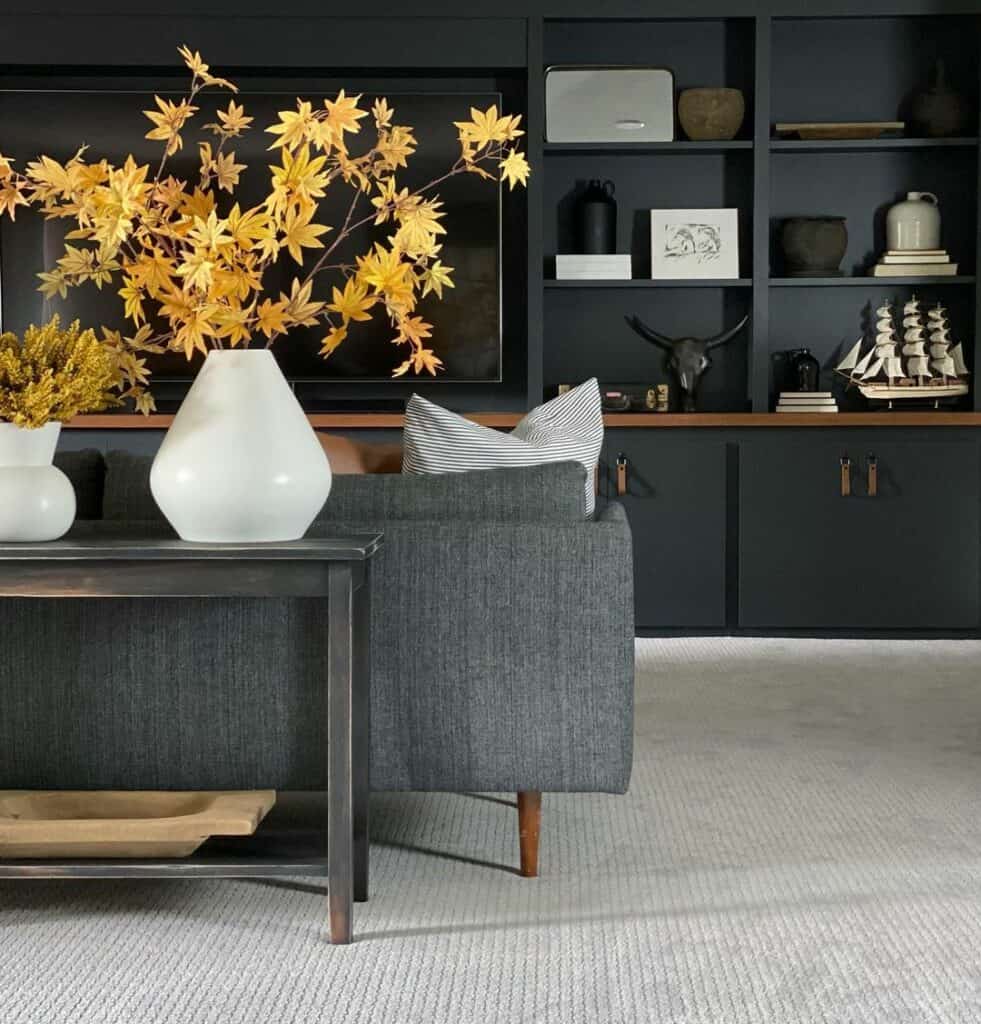 Black Living Room Design With Yellow Flowers
