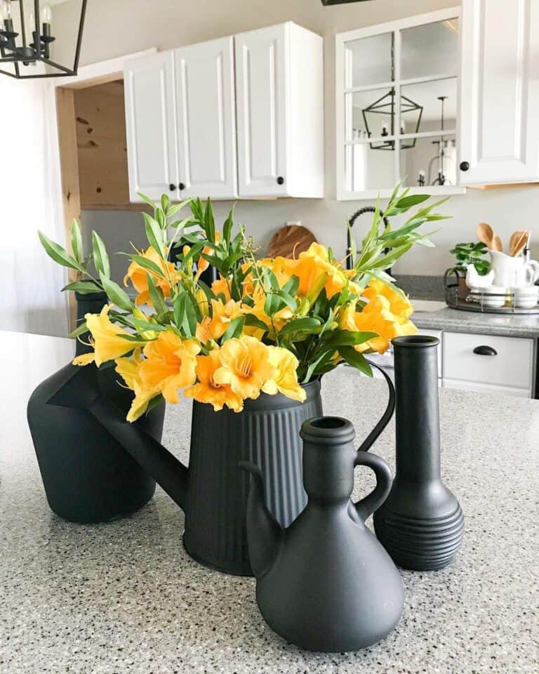 Black Vases With Yellow Flowers