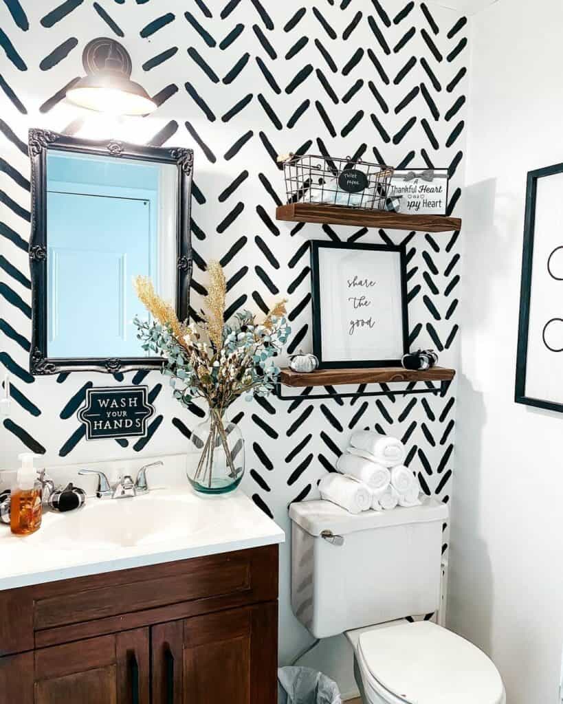 Black and White Bathroom With Herringbone Wallpaper
