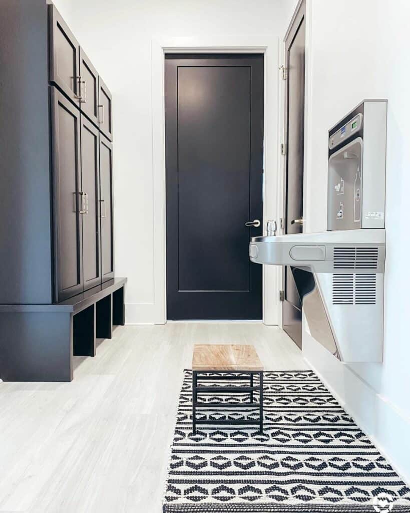 Black and White Mud Room With White Trim