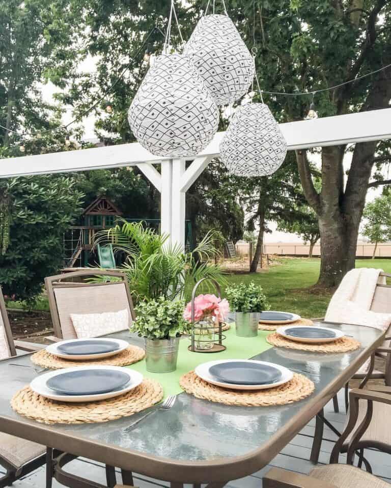 Black and White Patio Lights Above the Table