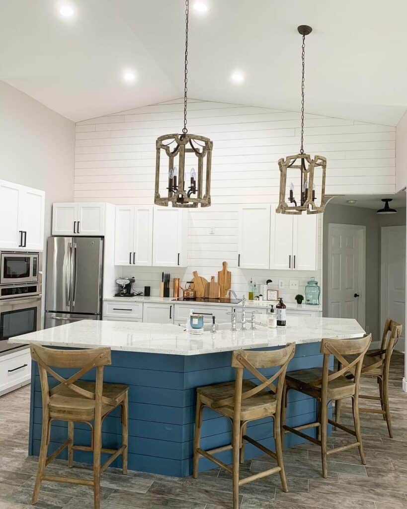 Blue Kitchen Island With Wooden Chairs