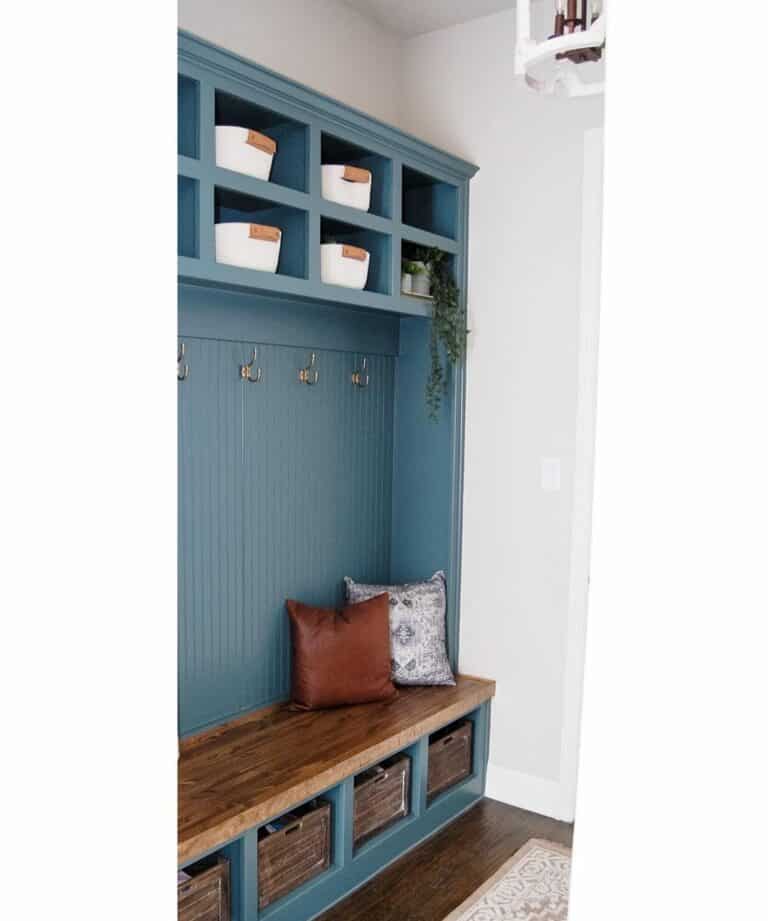 Blue Mudroom Built-in Storage Area With Wood Accents