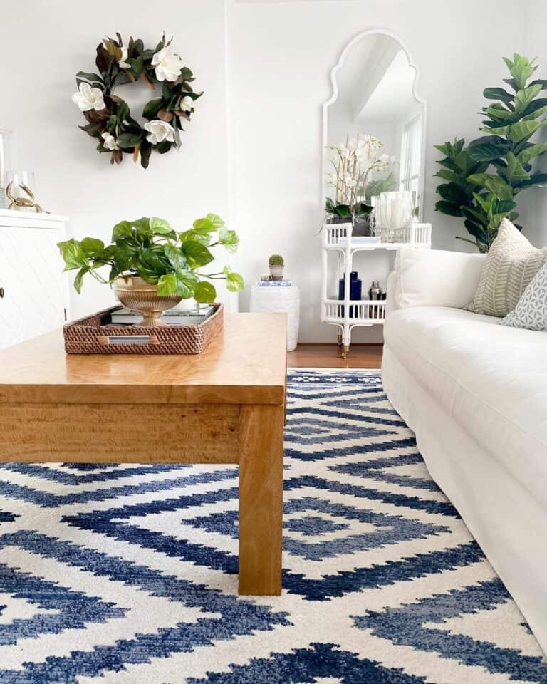 Blue and White Geometric Rug In White Living Room