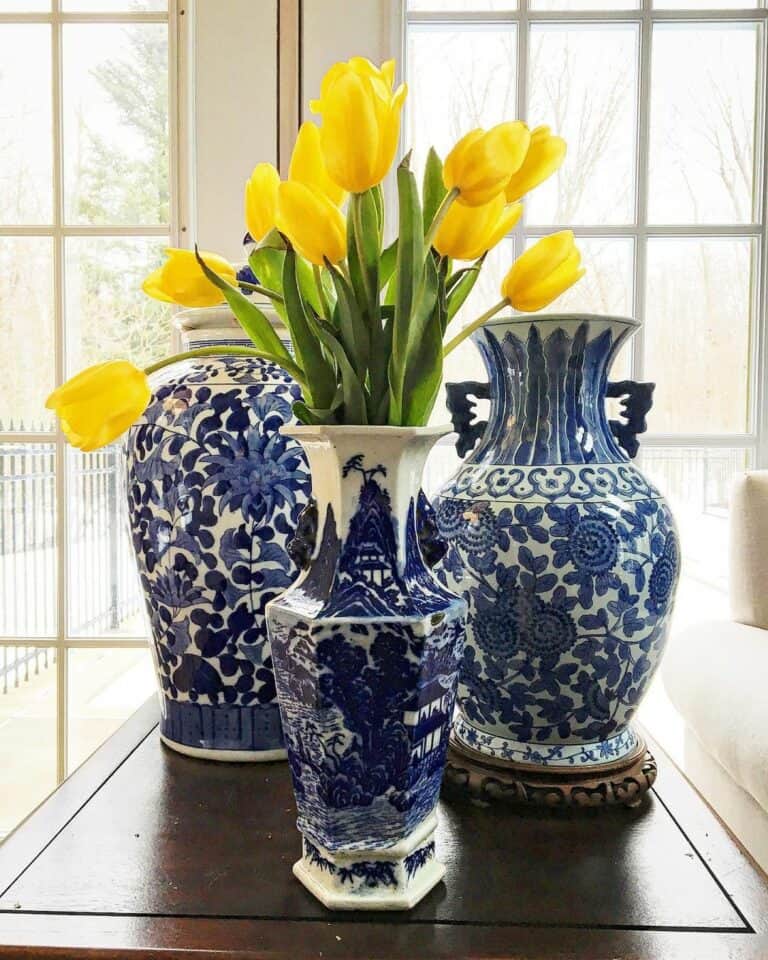 Blue and White Vases With Yellow Flowers